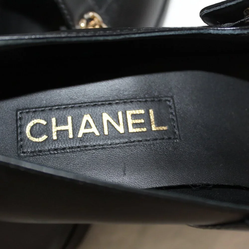 CHANEL Black Leather Mary Jane Flats with Gold CC Accent - Picture 8 of 16